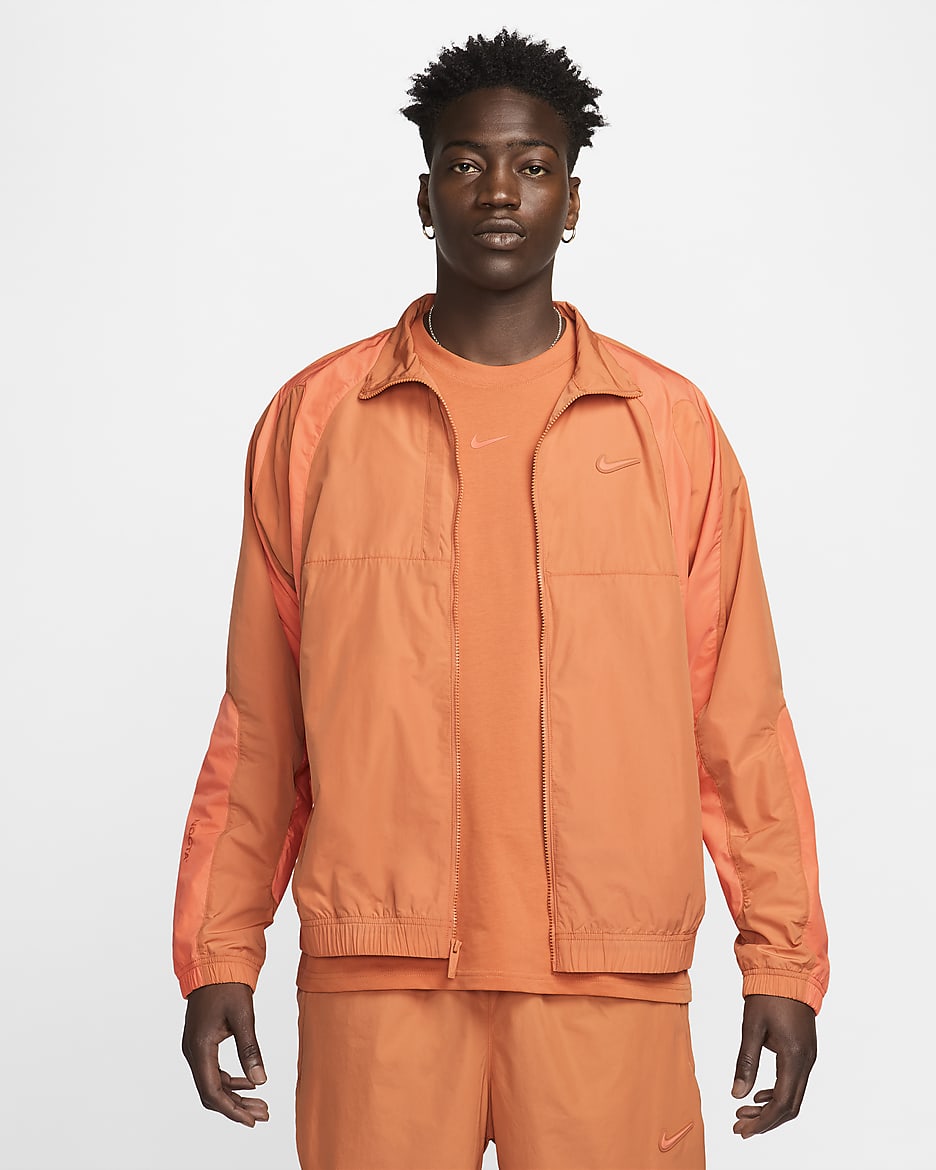 Orange windbreaker nike online